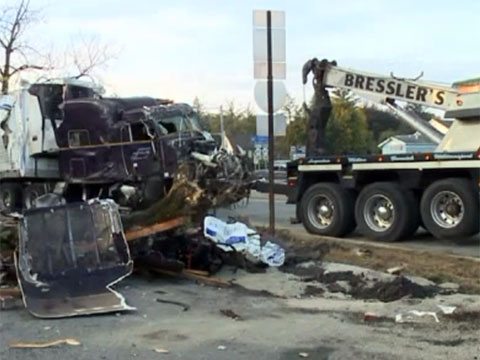 Tractor Trailer Crashes Into Traffic Signal, Building